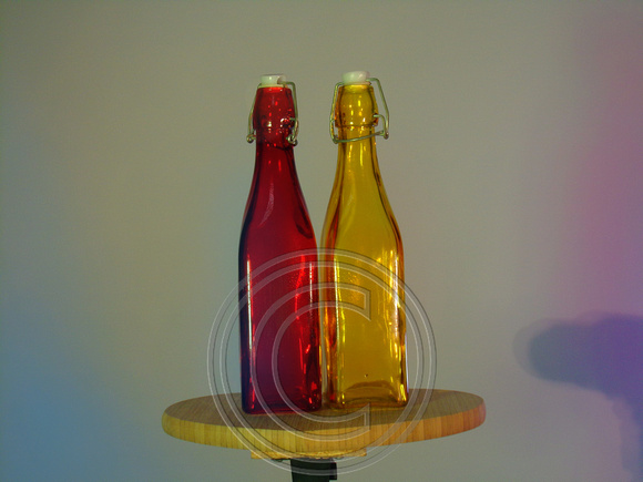 blue pink, red yellow bottle